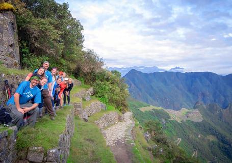 Passenger enyoing a view of Machu Picchu