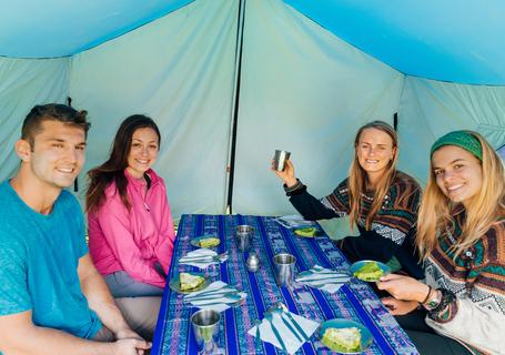5 Lares Trek - Tourists having breakfast in a tent in Lares