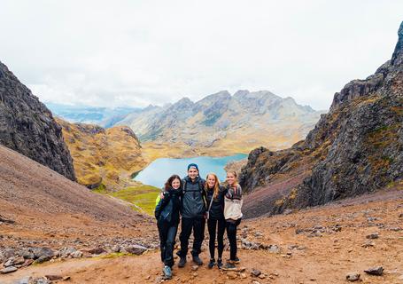 6 Lares Trek - Tourists at the highest point of the hike, overlooking Aruraycocha Lagoon