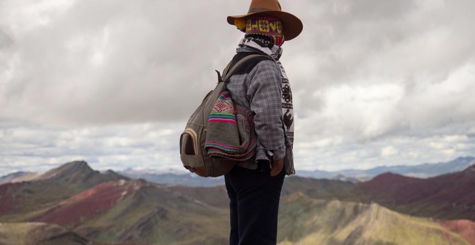 Marveling at Palcoyo rainbow mountain