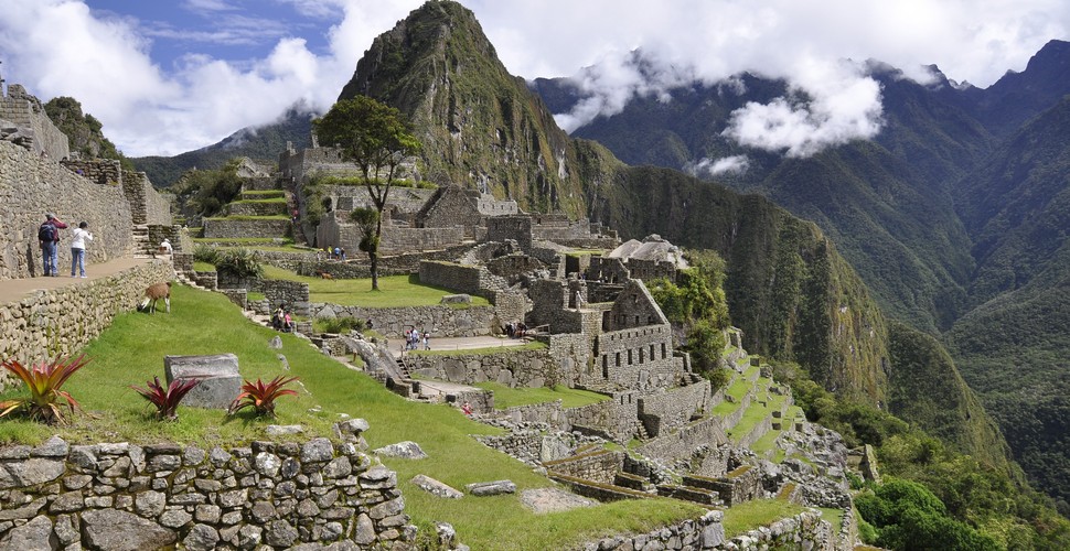Machu Picchu means "ancient mountain" in Quechua, Peru’s indigenous language in The Andes. Machu Picchu transformed from a simple summit to a sacred site during the rule of the Incas during the mid 15th century. Visit on Machu Picchu vacation packages.