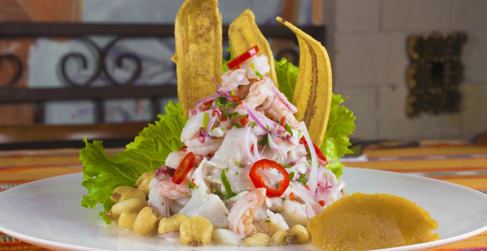 Taking pride of place in Peru’s national heritage, ceviche is a must-try Peruvian seafood dish. Although several different varieties exist, the classic Peruvian ceviche is comprised of raw fish marinated in fresh lime juice, Ají Amarillo (Peruvian yellow peppers), chopped red onions Salt and pepper for taste. Try Peru´s national dish on your Peru tour packages.