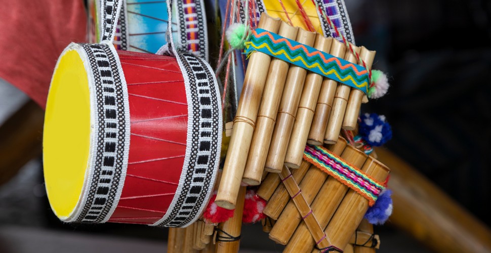 There is no indigenous musical instrument more iconic than the Peruvian panpipe. First developed in the Lake Titicaca region, these wooden flutes were believed to be used originally for herding goats. Today, the panpipe is a mainstay of Andean and Indigenous music and is used in many different ways, such as in religious ceremonies and for entertainment. Play some panpipes on your Cusco tours!