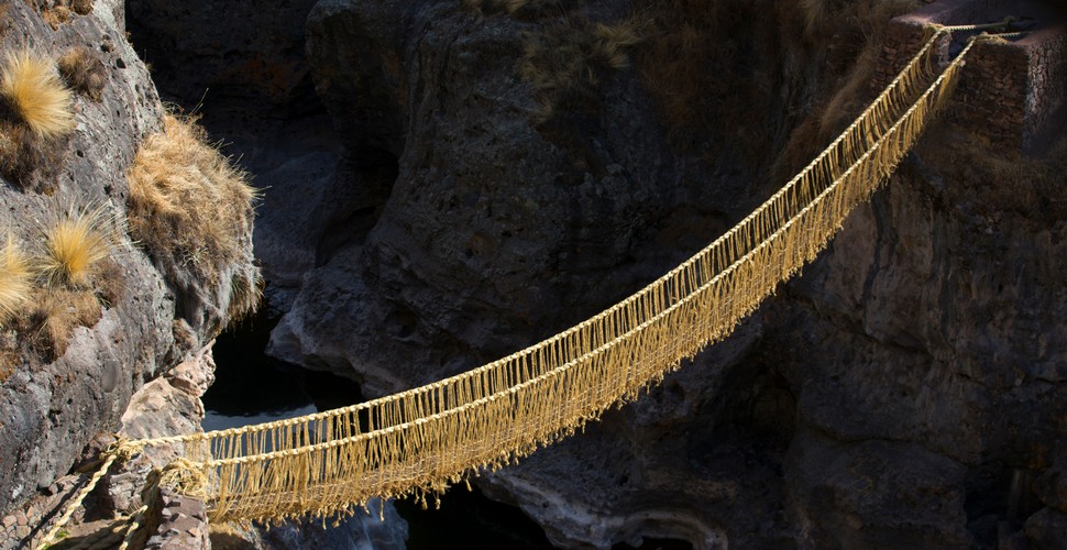 Rope bridges woven from grass and other traditional materials were commonplace during Inca times in the Andean region. Most of these bridges have disappeared over the centuries, of course, however, one still remains! This Inca bridge can be found in a village called Qeswachaka. In June each year, the bridge is rebuilt during a ritual ceremony that takes place over four days, and its completion is celebrated with a jolly good knees up! Visit on your Cusco day trips!