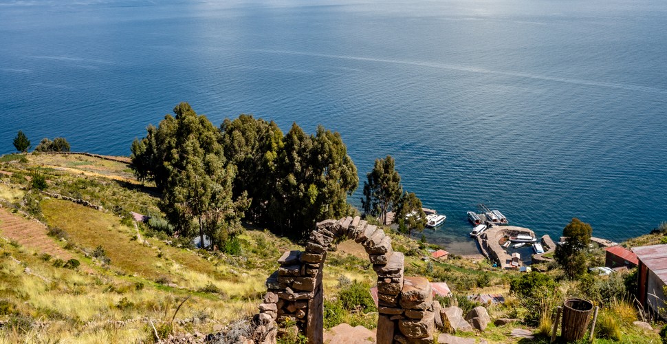 The rocky mountain of Amantani rises from Lake Titicaca, on the Peruvian side of the lake. Ancestral people have dwelled for millennia on the Islands of Titicaca. Amanani was first inhabited in the 6th century by the Tiwanaku people, a prominent pre-Hispanic society in the Andes. They constructed remarkable buildings on Amantani but abandoned the island. Amantai was later populated by the Aymara, who still live there to this day. Visit on a Puno to Lake Titicaca tour.
