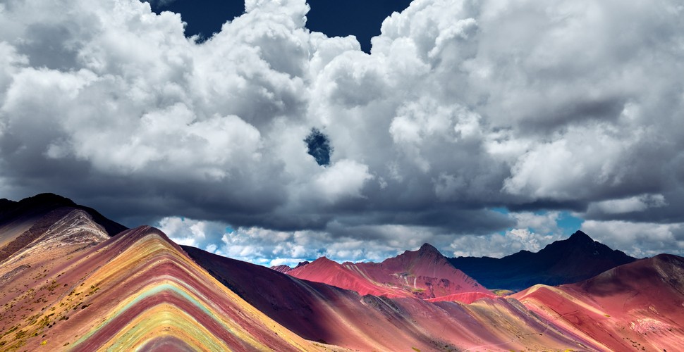  Also known as the "Mountain of Seven Colors," Rainbow Mountain is a 5200m /17,000-foot tall mountain that you can visit on Cusco day tours. In 2013, this  "new" geological wonder was exposed that had been previously covered in snow, called Vinicunca. The mountain is said to fertilize Pachamama or Mother Earth herself. Local people consider this mountain to be the spiritual protector of the people. Rainbow Mountain even rivals Machu Picchu as the most-visited destination in the Cusco region!