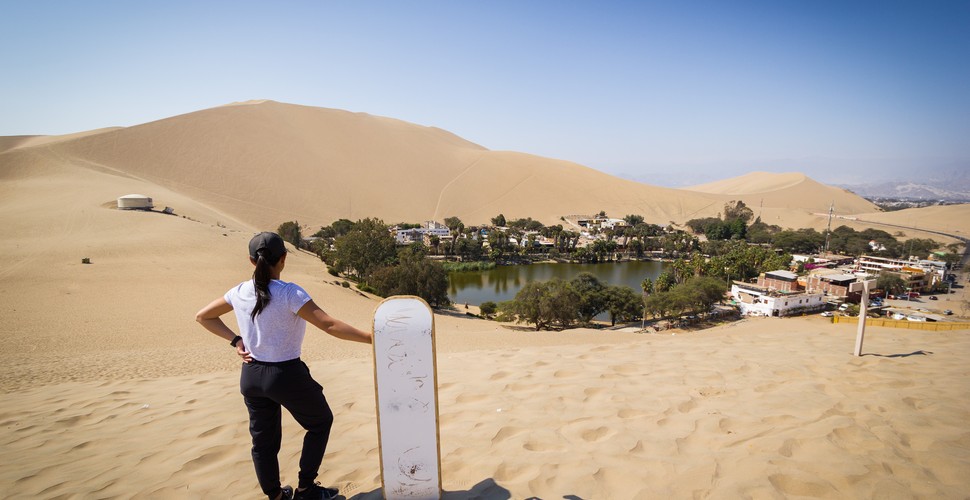 Strap on a sandboard and hurl yourself down a hundred-meter dune on a Huacachina day trip from Lima. This bucket-list activity on your Peru tour packages is one of the hights of the country and all of South America. Staying upright on these "planks of wood" is pretty difficult – even for those who know how to surf, skate, or snowboard – so lie down face-first, and slide your way down for the ultimate adrenalin hit and a faceful of sand! 