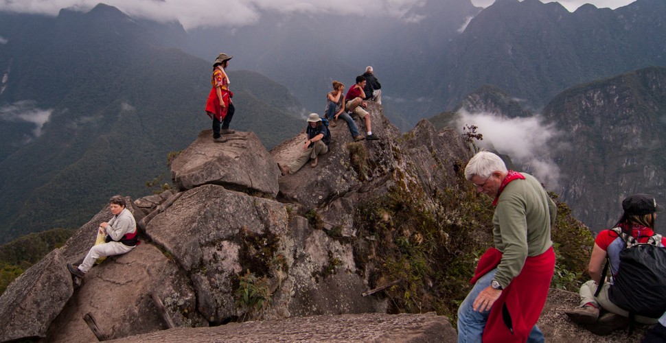 At the peak, adventurers are rewarded with unrivaled vistas of Machu Picchu, stretched out beneath them resembling a tiny urban landscape. The scene offers extensive panoramic views of the valley below and the neighboring Andean mountains. The summit offers spectacular scenery for capturing photos and a moment of mesmerizing contemplation on your Peruvian adventures.