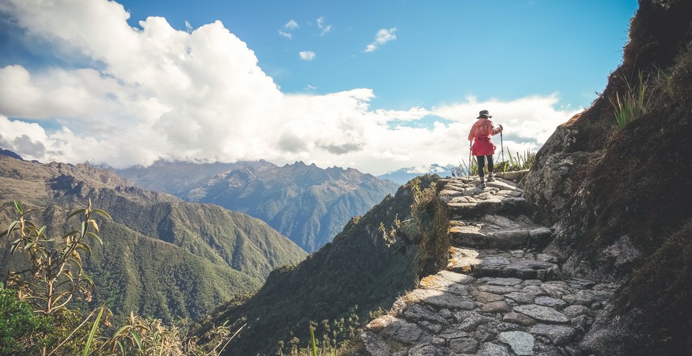 Walking in the footsteps of the ancient Incas along the short Inca Trail is a powerful experience. This centuries-old trail passes a number of Inca sites, winds through lush cloud forests, with views of snow-capped mountains, and is an awe-inspiring hike when you visit Peru.