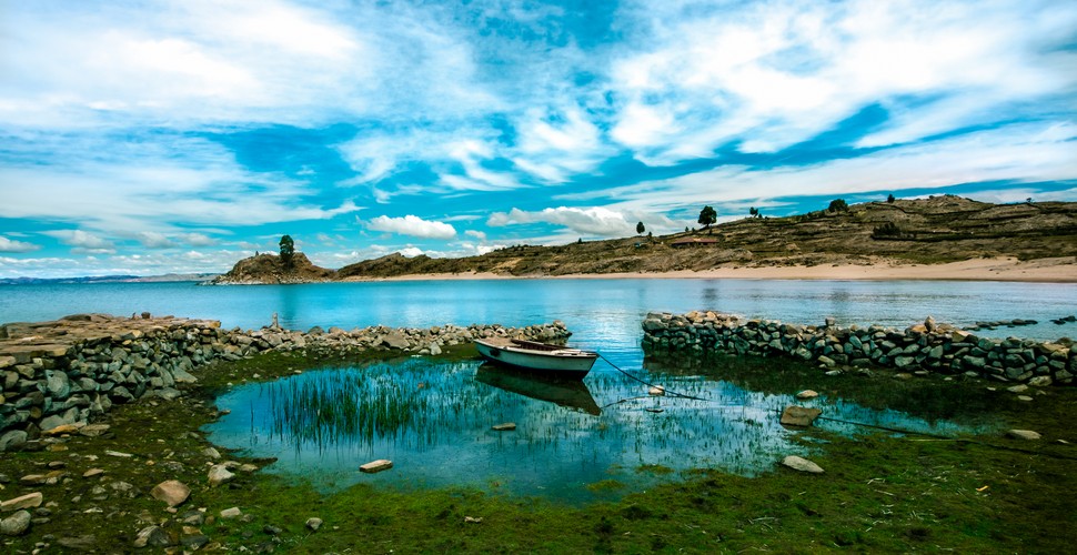Amantani island is known for its peaceful setting and strong sense of community. It is lesser visited than Taquile yet offers a rich cultural experience. On your Lake Titicaca tours from Puno, you can visit Amantani to see its temples, traditional dances and ceremonies, and stay with local families in homestays.