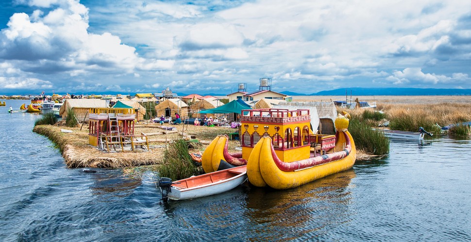 The Uros Floating Islands are arguably the main attraction to visit on Lake Titicaca, on your Peru vacation packages.  These man-made islands are constructed from totora reeds by the Uros people. They have lived in the way, on the lake for centuries.