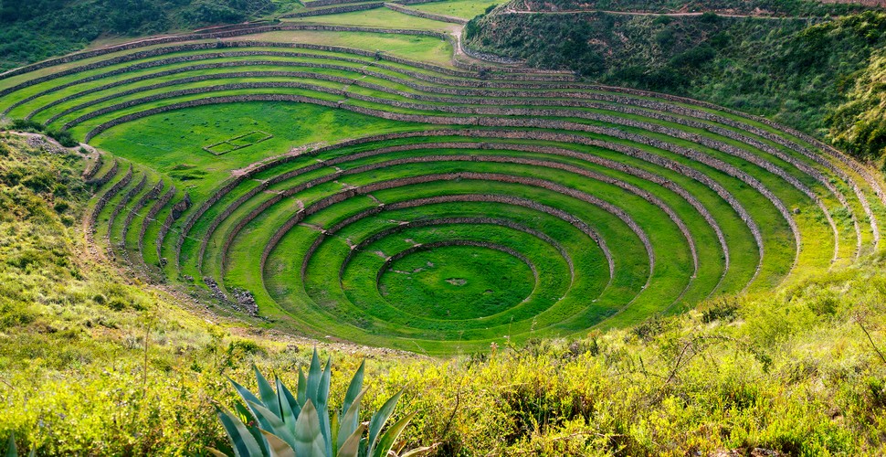 Cusco excursions to Moray will take you to an unusual archaeological site. Moray is a series of circular terraces built into the hillside. These terraces were used by the Incas for crop experimentation and certain rituals. These amazing terraces  plunge into the ground,  and resemble a Roman amphitheater. 