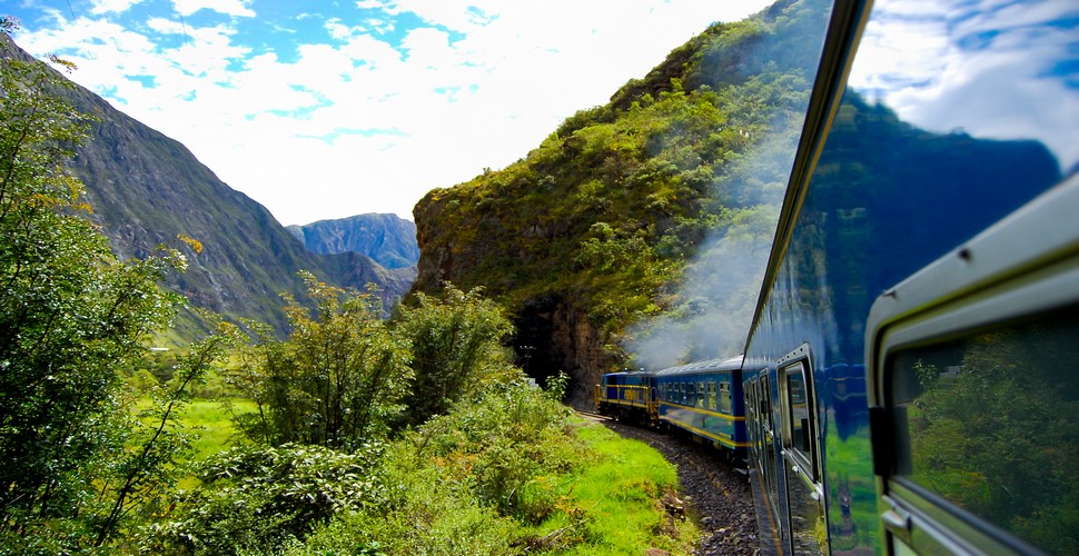 Traveling by train on your Machu Picchu vacation package is one of the most scenic and memorable ways to reach the ancient Inca citadel of Machu Picchu. With various train options available, from the luxurious Hiram Bingham to the panoramic Vistadome and the budget-friendly Expedition, there is a choice to suit every traveler's style.