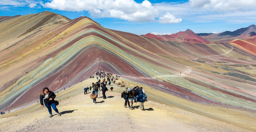Visiting Rainbow Mountain (Vinicunca) in Peru is a breathtaking experience, sometimes literally! This is one of the most popular Cusco day trips. It's important to be prepared for the high altitude and challenging terrain. We recommend that you spend a few days in Cusco to acclimatize before attempting the trek.