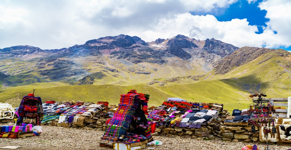 La Raya is a high mountain pass located on the road between Cusco and Puno in Peru. It marks the border between the two Peru regions and is known for its stunning views of the surrounding Andean mountains. You will pass through La Raya on Puno tours from Cusco.