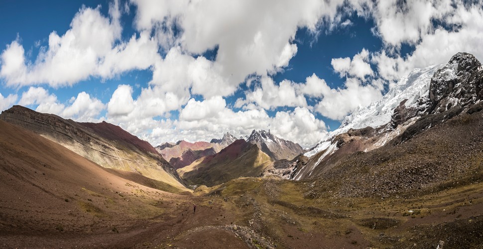 The Ausangate Circuit in Peru is a trekking route that winds through some of the most stunning and remote landscapes in the Andes. On your Peru adventure tours, hike the Ausangate Trail that includes Rainbow Mountain and a transfer to Machu Picchu. For the complete Andean trekking experience!