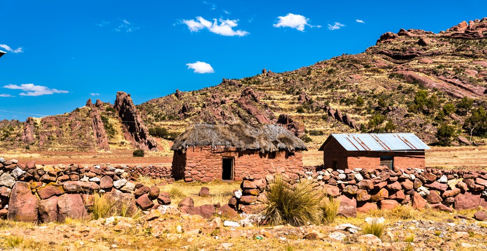 Andean adobe constructions are a traditional building style found throughout the Andean region, including on the Lares Valley Trek to Machu Picchu.  Adobe is a mixture of mud, clay, straw, and sometimes other organic materials, formed into bricks and dried in the sun. 
