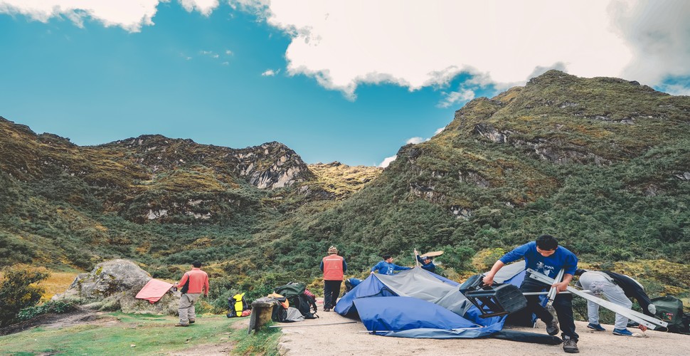 Porters play a key role in environmental conservation by following Leave No Trace principles. After trekkers have woken and are trekking along the next section of their Inca Trail trip, they ensure that the trail and campsites are kept clean and undamaged.