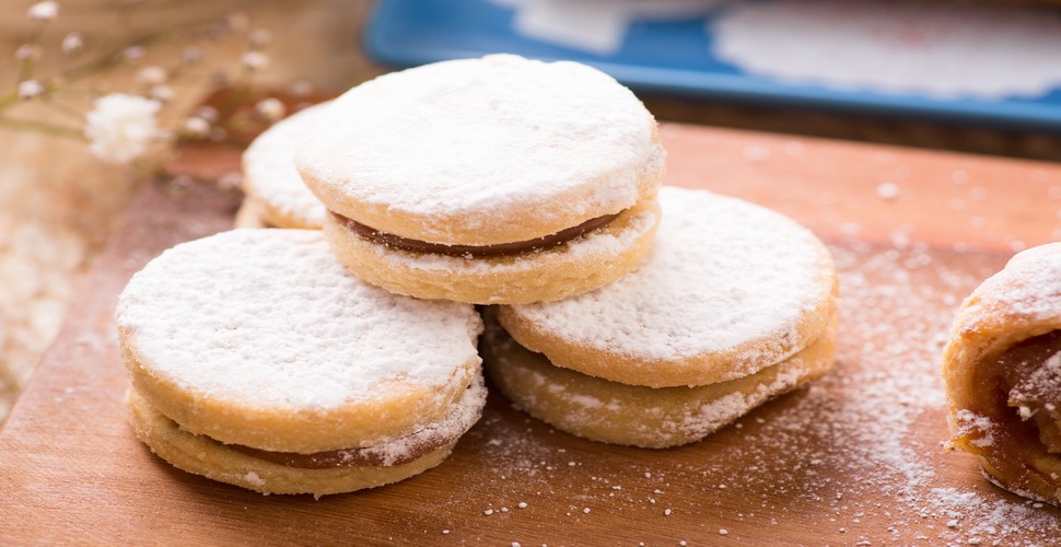 Alfajores are a popular sweet treat on your Peru vacation packages. They consist of two soft, crumbly cookies sandwiched together with dulce de leche, a sweet caramel-like filling made from condensed milk. Check out the local "panaderías" on your custom Peru tour. 