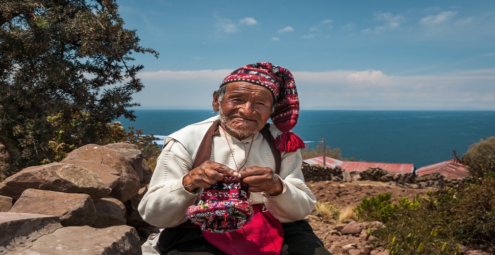 In communities such as Taquile Island in Peru, men are often the primary weavers, while on the Uros Islands, women are more commonly involved in weaving. The textiles you can see on Lake Titicaca tours from Puno, are known for their vibrant colors, intricate designs, and high quality.