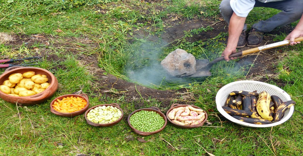 During celebrations of Pachamama Andean communities may come together to prepare and share a Pachamanca. The traditional dish is typically made by digging a pit in the ground, heating stones, and then layering meats, potatoes, vegetables, and herbs on top of the hot stones.  Sample a delicious Pachamanca at Peruvian festivals on your Peru vacation packages. 