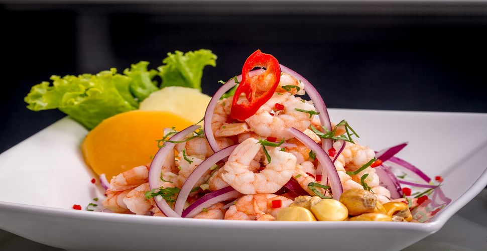 Ceviche is the national dish of Peru and is particularly popular during Fiestas Patrias. Be tried on The Coast when you visit Peru, it is made with fresh fish or seafood. The fresh fish is marinated in lime juice, mixed with onions, cilantro, and chili peppers, and served cold.