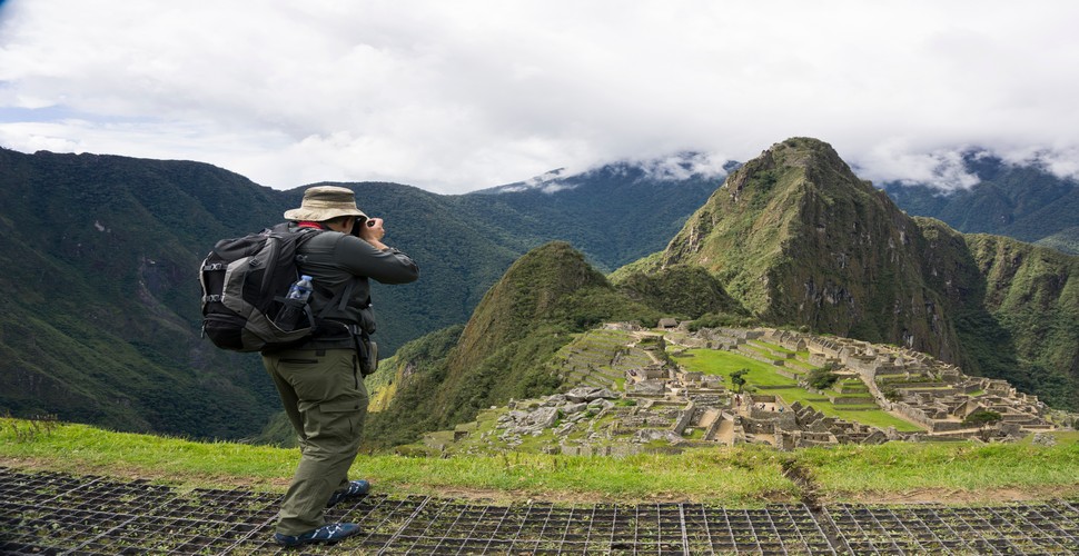 The perfect photo on vacation packages to Peru Machu Picchu comes down to a combination of timing, location, and the correct camera equipment. The Guardhouse offers a panoramic view of the entire citadel to take the classic Machu Picchu shot that captures the terraces and the surrounding mountains.