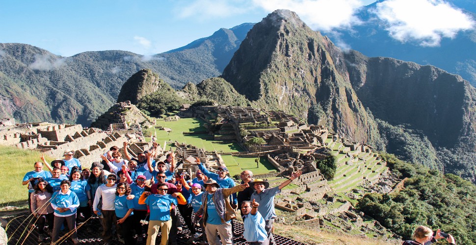 A Valencia Travel Group arriving at Machu Picchu after hiking the Inca trail