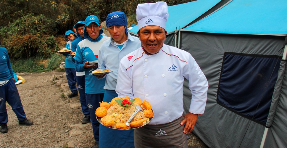 The Chef and his assistants up with culinary masterpieces on The Inca Trail