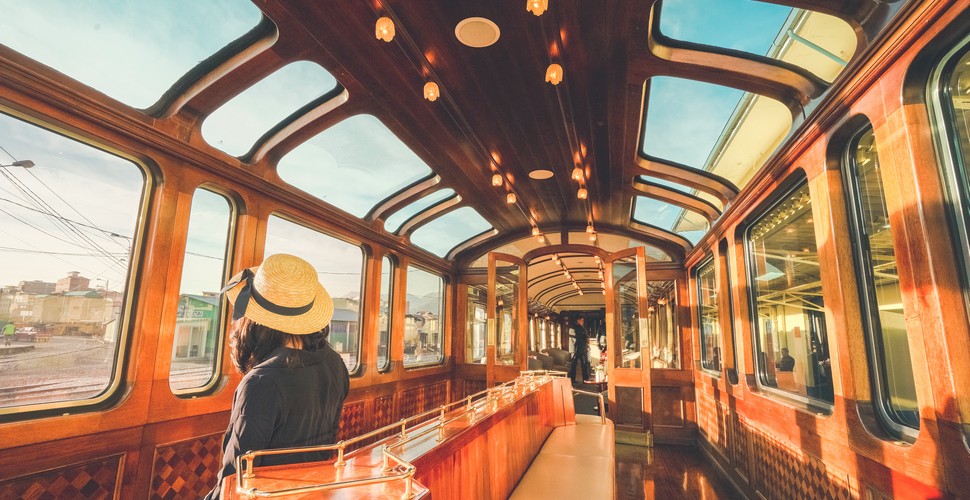 Female Traveler on The Titicaca Train on their Peru Vacation Package