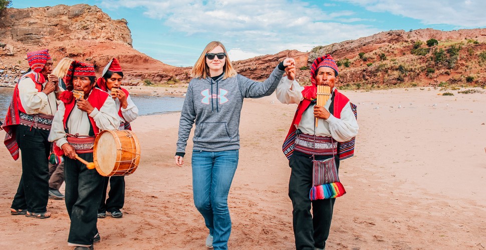 Partying on Lake Titicaca with the Local Community on Peru Travel Packages!