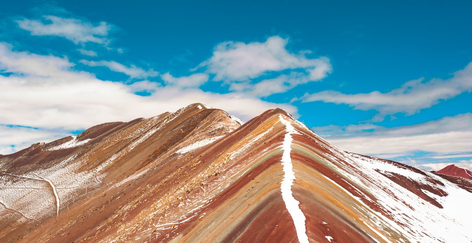 A parially snowy Rainbow Mountain  A glimpse of how it used to be!