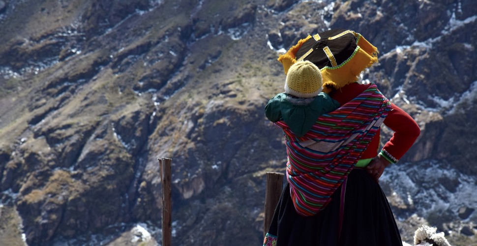 Local Mother and Child on The Ausangate and Rainbow Mountain region.