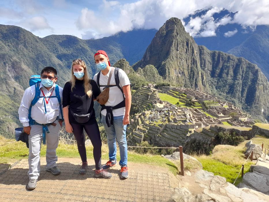 Guide with a Group in Machu Picchu