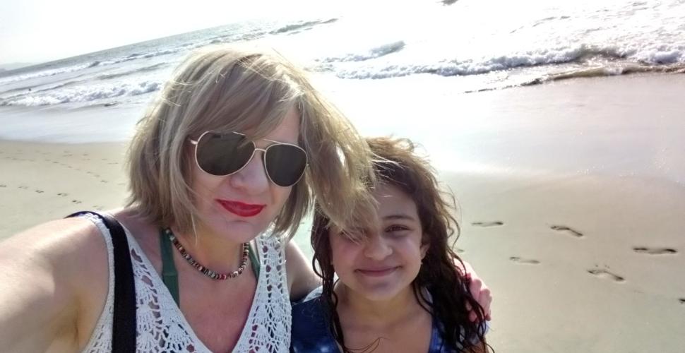 Claire and her daughter at the beach